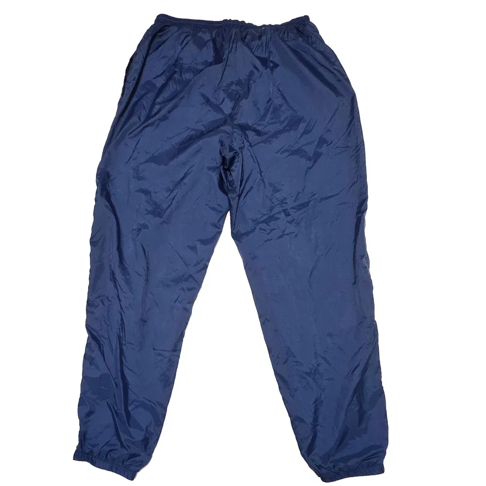 VTG Nike Windpants Mens XL Blue Nylon Track Pants Zipper Cuffs Lined Swoosh